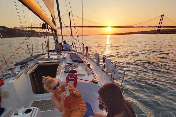 Lisbon Travel Guide: Alfama & Belém, Tram 28 & Sintra Day Trip (2026) 11 Lisbon Sunset Sailing with Portuguese Wine and History
