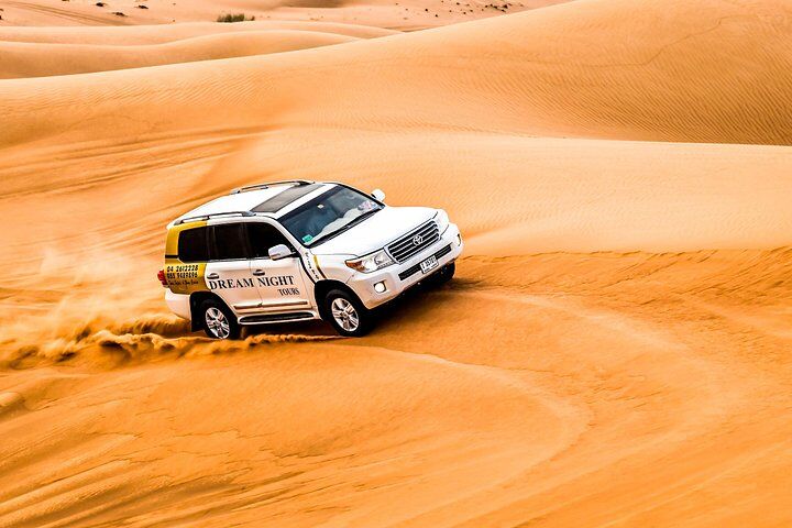 Dubai Desert Safari With Dune Bashing, Camel Ride & BBQ Dinner (2026 Review & Booking Guide) 1 Dubai Desert Safari With Dune Bashing, Camel Ride & BBQ Dinner in Dubai