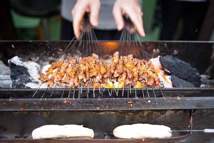 Xi'an Evening Food Tour by TukTuk (2026 Review & Booking Guide) 1 Xi'an Evening Food Tour by TukTuk in Xian