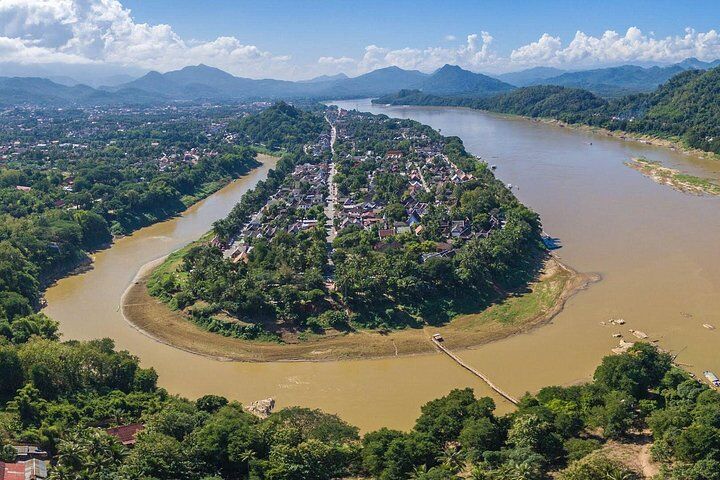 Luang Prabang: Cruise to Pak Ou Caves & Kuang Si Waterfalls in Luang Prabang