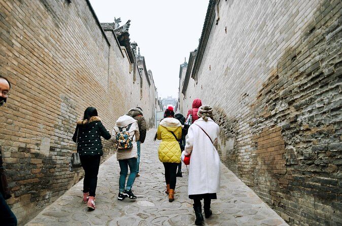 Pingyao Day Tour of Wang Family Mansion and Shuanglin Temple